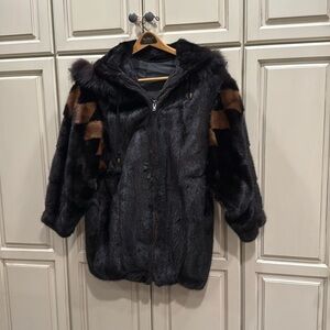 Female mink jacket with diamond pattern on sleeves